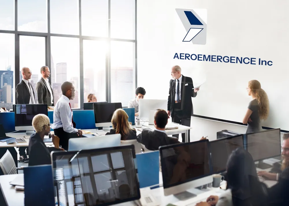 Aeroemergence Inc office interior with staff working and a presentation in progress